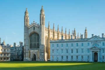 Scenic view of Cambridge University, highlighting the historic architecture, tranquil surroundings, and academic charm of this renowned educational institution.