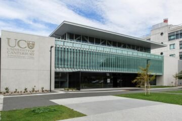 A captivating image capturing the essence of Canterbury University in New Zealand, harmonizing modern education with scenic surroundings.