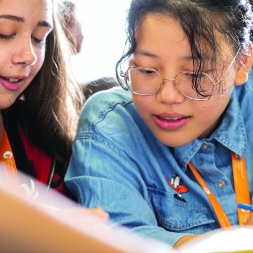 Children study together in a summer school