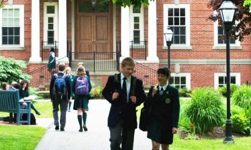 Charming image capturing the warmth of children's boarding school life. A vibrant, supportive community fostering learning and growth. Explore educational possibilities for your child with our consultancy.