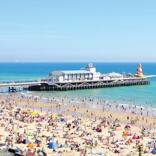 A view of Bournemouth pier and beach.