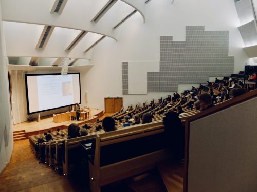 Engaged participants in a university seminar for certificate and diploma programmes, reflecting collaboration, knowledge-sharing, and interactive learning.