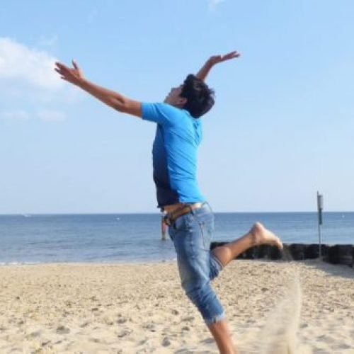 Student from Westbourne Academy summer schools in Bournemouth is playing volleyball.