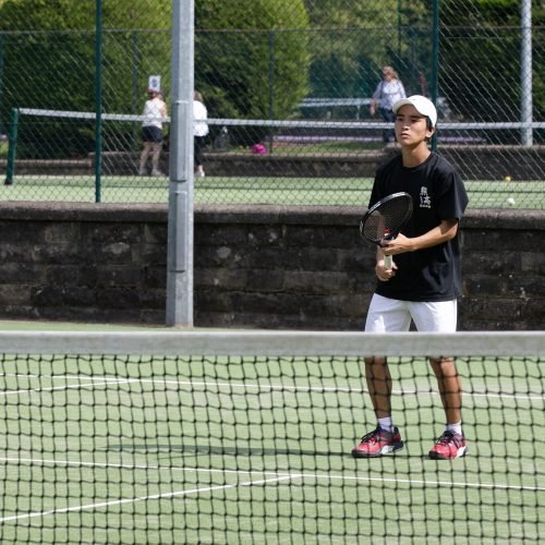 A snapshot of one student from Wimbledon Summer School in London while playing tennis.